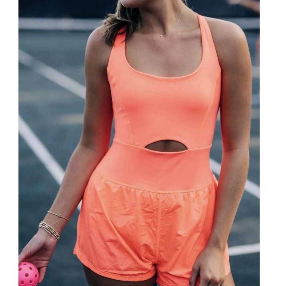 FREE PEOPLE Movement Righteous Runsie in Neon Coral Size small